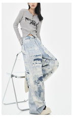 Model wearing Cloud Wash High Street Wide Leg Jeans paired with a striped top for a trendy look