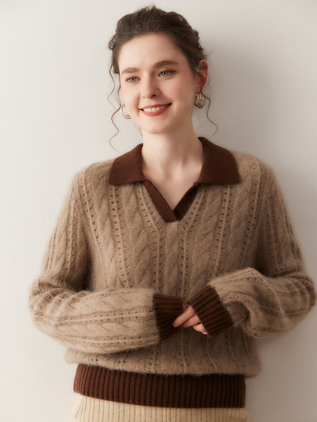 Cloud Weave Cashmere Crochet Sweater with a cozy V-neck and ribbed cuffs in brown tones