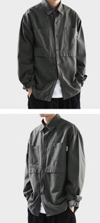 Men's oversized cotton cardigan in dark green with front pockets and button-down design