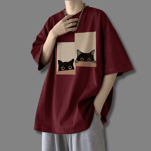 Curious Cats T-Shirt in Burgundy featuring playful cat graphics on a comfortable loose fit