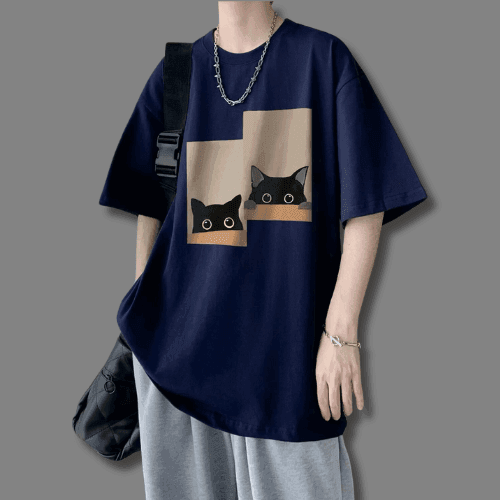 Curious Cats T-Shirt in navy featuring playful cat graphics on a stylish oversized fit