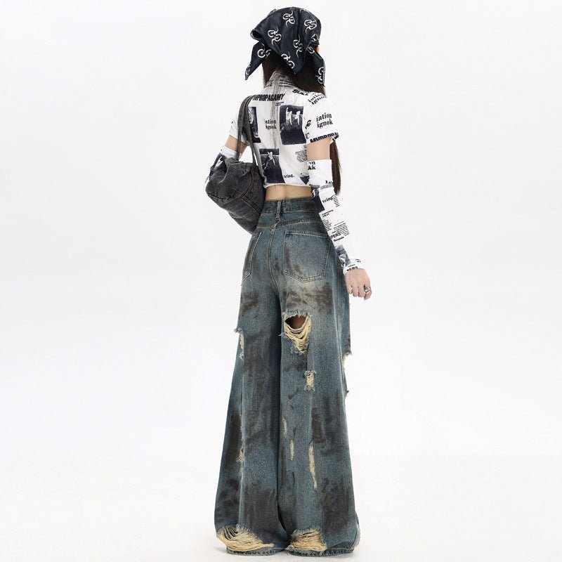 Fashionable Destroyed Flared Jeans with Ripped Details and Wide Leg Design for Trendy Outfits