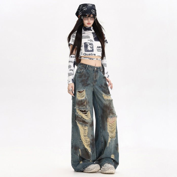 Fashion model wearing AM Vision RO Destroyed Flared Jeans with trendy rips and a relaxed fit