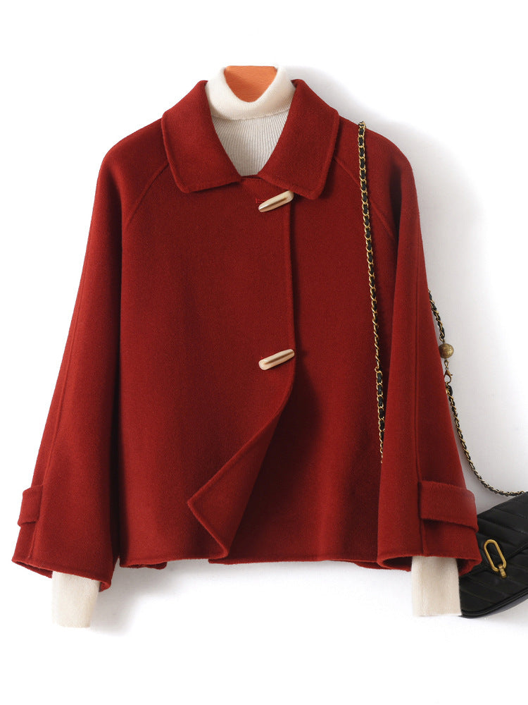 Stylish red double-faced wool short coat with unique buttons and cozy fit for winter fashion