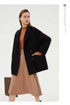 AM Vision RO Double-Faced Wool Velvet Coat styled with a pleated skirt for a chic winter look