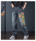 Dragon Legacy Embroidered Jeans featuring a vibrant dragon design on the side for a unique style