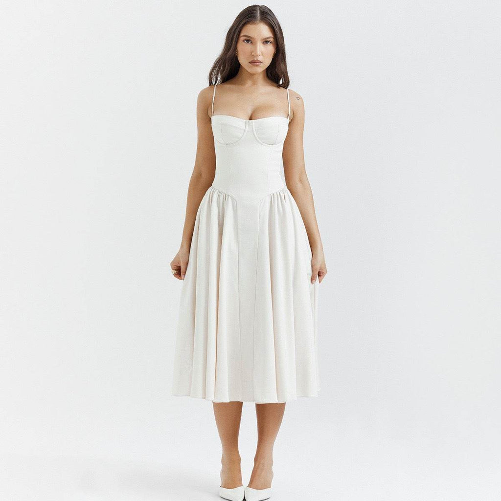 Elegant white dress with minimalist design featuring a fitted bodice and flowing skirt