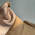 Close-up of Elara Wool Coat Cashmere X Mulberry Silk showing luxurious fabric texture and detailing