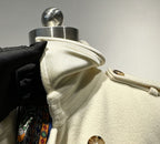 Elara Wool Coat Cashmere X Mulberry Silk on display with stylish collar and button details