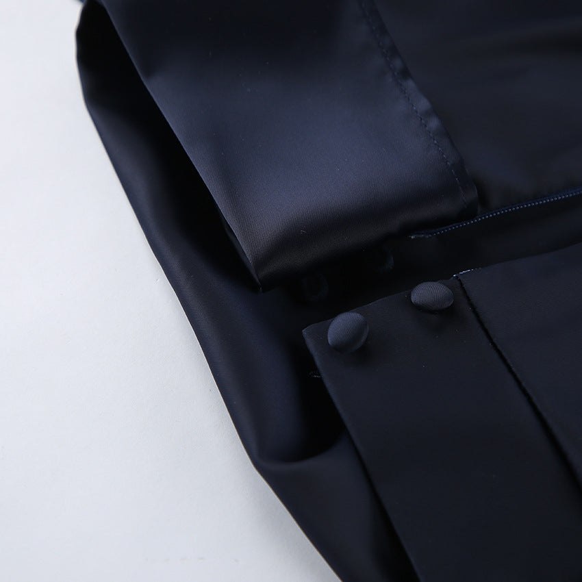 Close-up of the Elegant Bell Sleeve Dress showing detailed fabric and button design