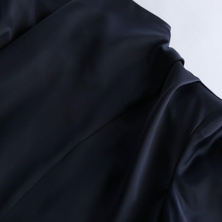 Close-up of Elegant Bell Sleeve Dress fabric with smooth texture and rich color