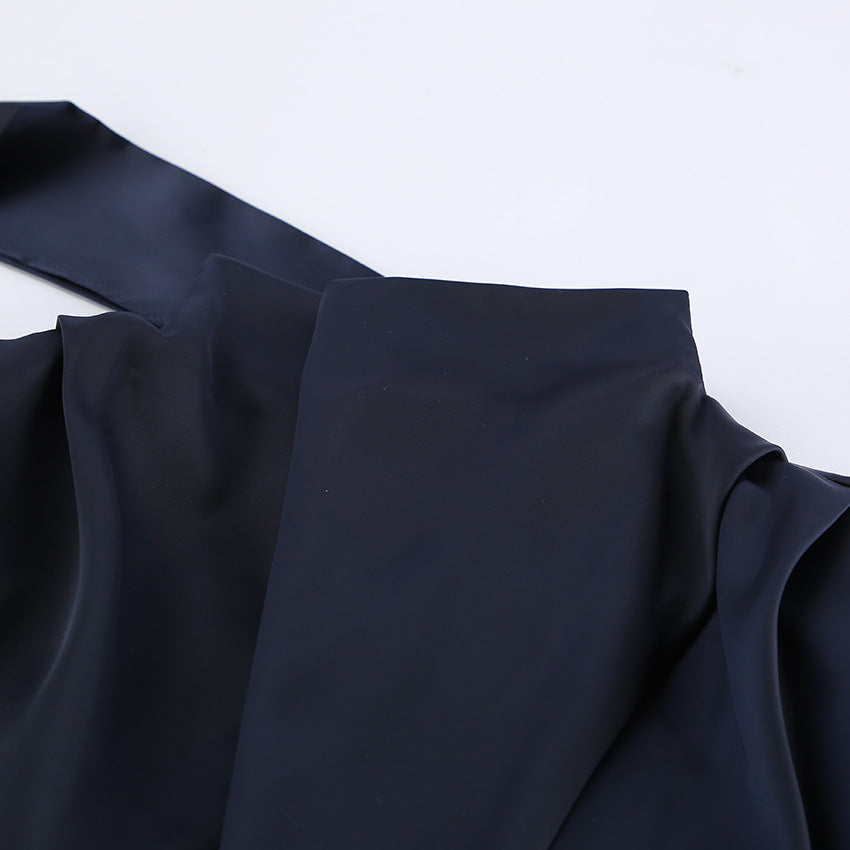 Elegant Bell Sleeve Dress in dark fabric with a smooth neckline and flowing sleeves for a chic look