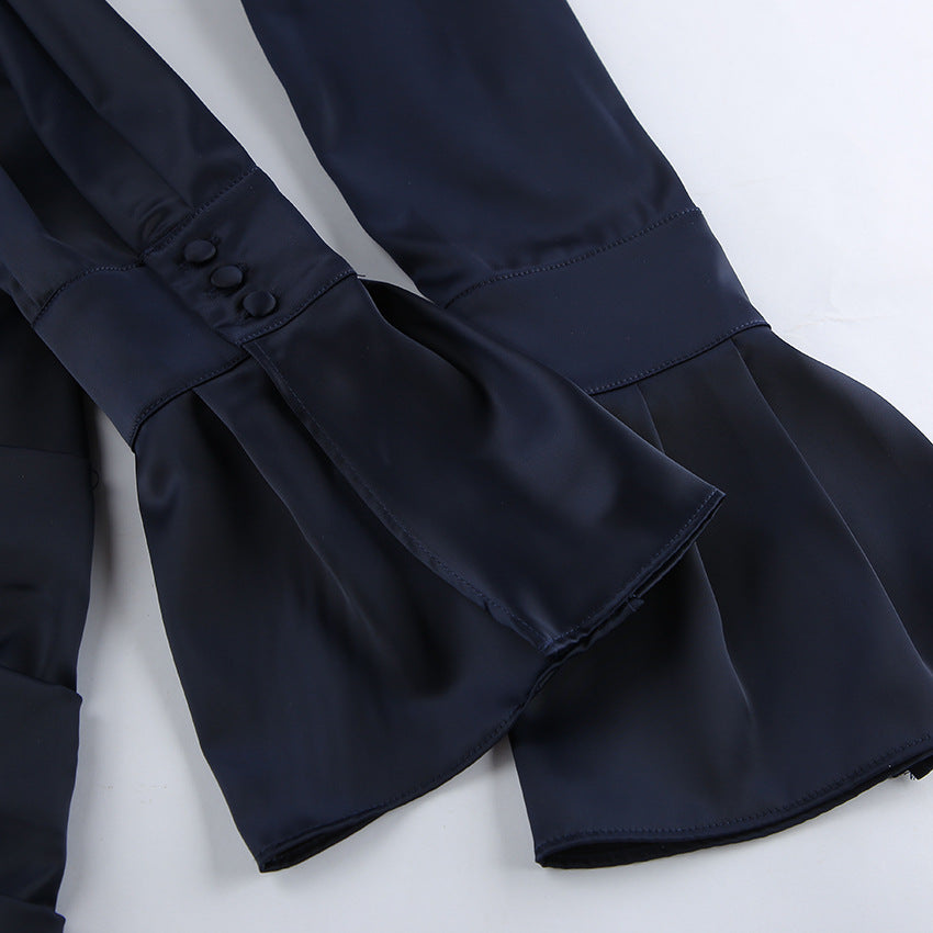 Close-up of Elegant Bell Sleeve Dress showcasing the stylish flowing sleeves and button details