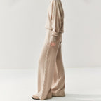 Elegant cashmere lounge pants in a soft beige color for comfortable, stylish wear at home