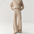 Elegant cashmere lounge pants in beige with a relaxed fit for ultimate comfort and style.
