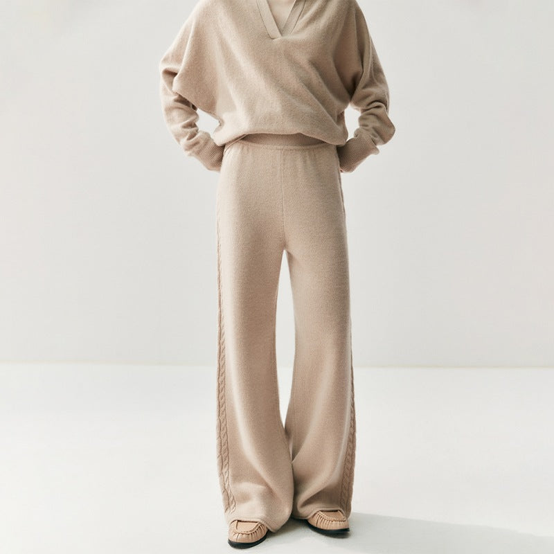 Elegant cashmere lounge pants in beige with a relaxed fit for ultimate comfort and style.