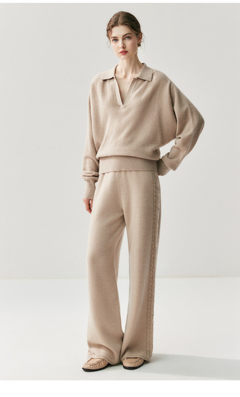 Model wearing elegant cashmere lounge pants paired with a matching soft sweater for a chic style