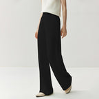 Elegant cashmere lounge pants in black with a relaxed fit and flowy design for stylish comfort