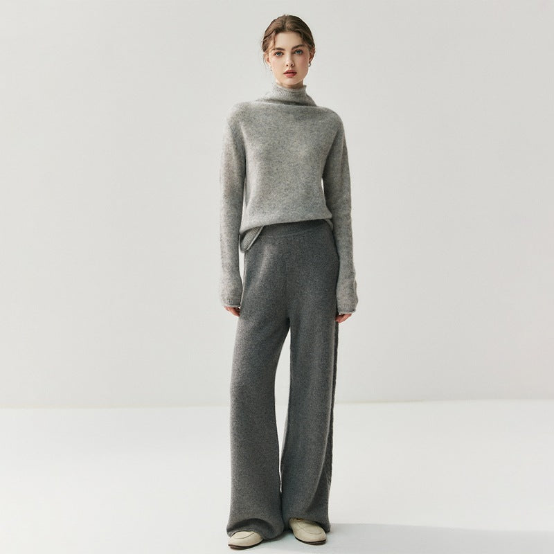 Stylish model wearing elegant cashmere lounge pants paired with a matching sweater for a chic, comfortable look
