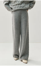 Elegant cashmere lounge pants in soft gray with a relaxed fit for comfortable wear at home