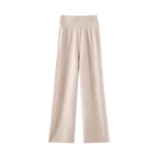 Elegant cashmere lounge pants in soft beige with a comfortable wide waistband for ultimate relaxation
