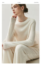 Model wearing elegant cashmere lounge pants paired with a cozy sweater in a neutral tone