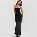 Elegant Long Dress with Bare Shoulders in Black, featuring a fitted silhouette and ruched detailing