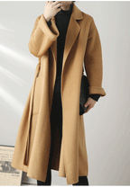 Eloane Elegant Ripple Wool Coat in camel color with a long, relaxed fit and front pockets