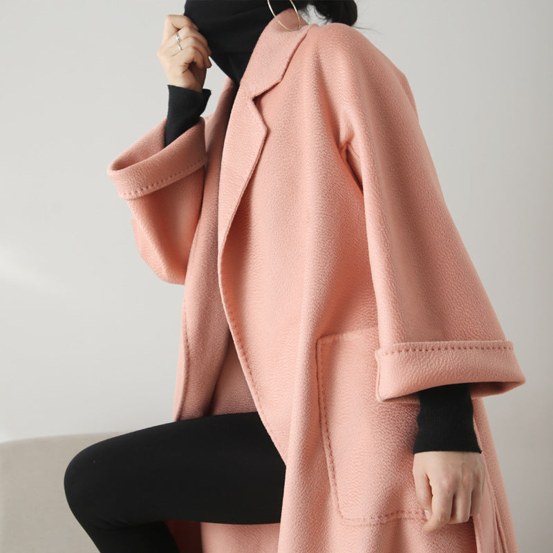 Eloane Elegant Ripple Wool Coat in soft pink with oversized pockets and a stylish silhouette