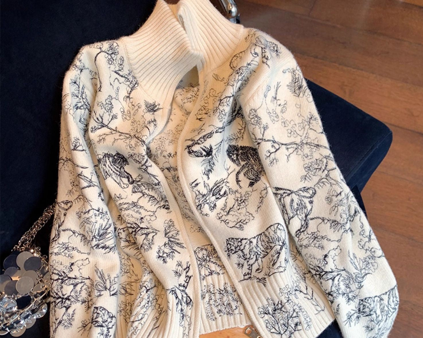 Emblem Knit Zip Jacket with intricate animal print design in a cozy, stylish knit fabric