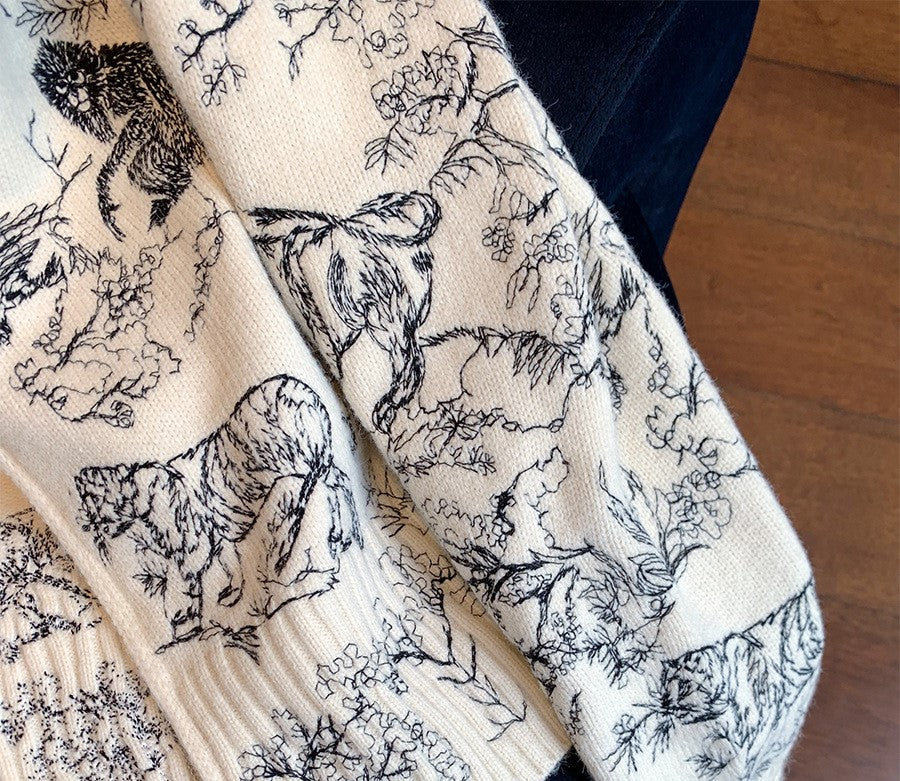 Emblem Knit Zip Jacket featuring detailed animal and floral prints for a stylish look