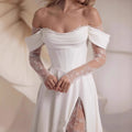 Ethereal One Shoulder Lace Trail Wedding Gown with Off-Shoulder Sleeves and Intricate Lace Details