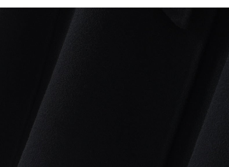 Extra-Long Double Wool Coat With Detachable Shawl Collar in black fabric close-up view