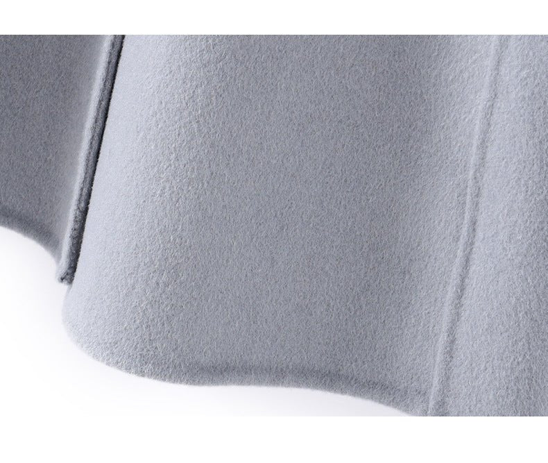 Close-up of an Extra-Long Double Wool Coat With Detachable Shawl Collar in soft gray fabric