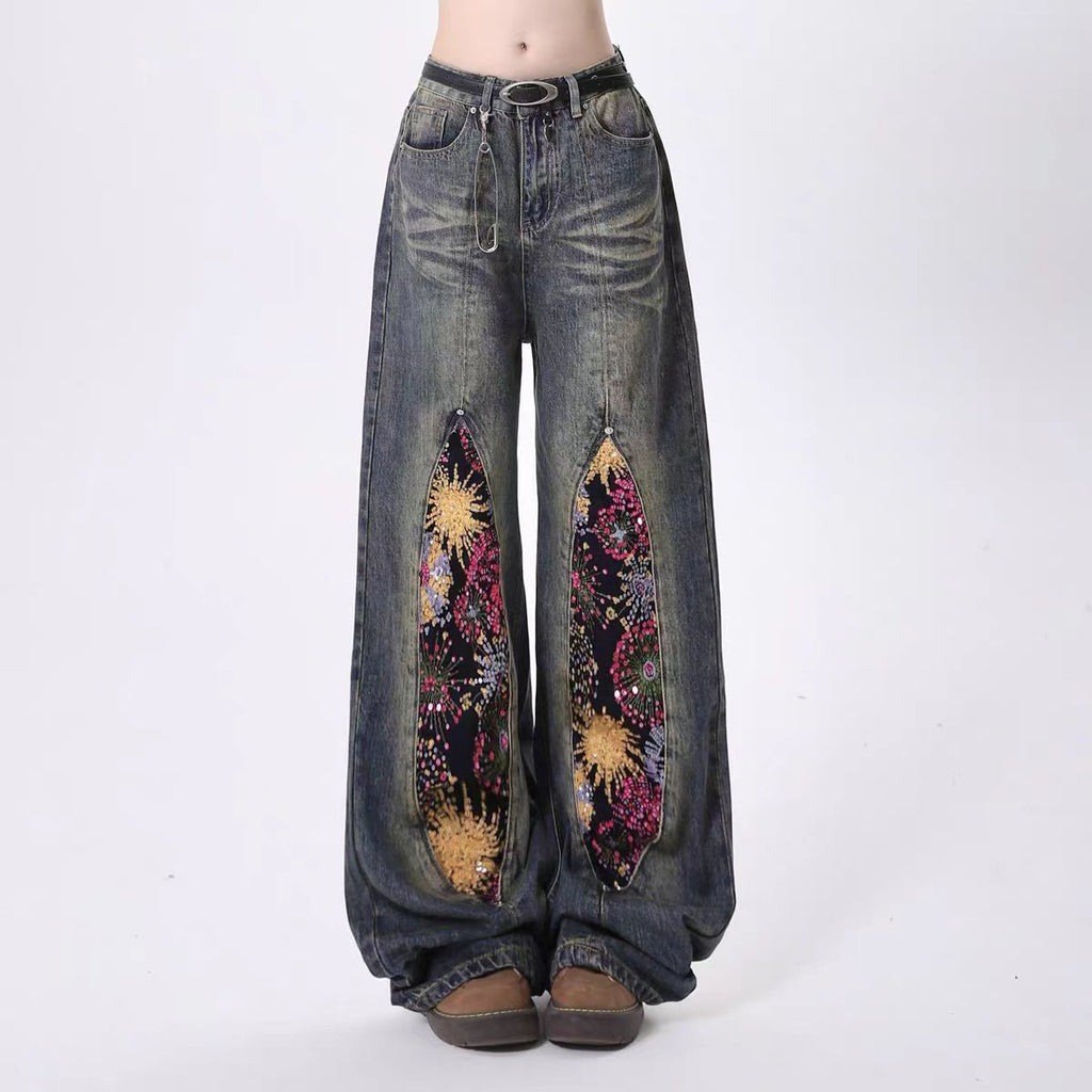 Firework Bloom Wide-Leg Denim Pants with floral patches and a relaxed fit for a trendy look