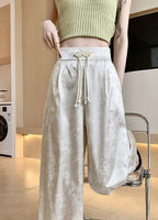 Elegant Floral Glow Pants in soft fabric, featuring a stylish printed design and drawstring waistband