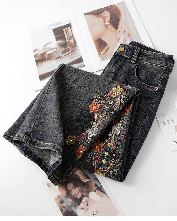 Floral Rhinestone Vintage Jeans featuring intricate floral embroidery on dark denim fabric