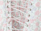 Close-up of French Floral Lace Slip Dress featuring a floral pattern and lace-up detailing