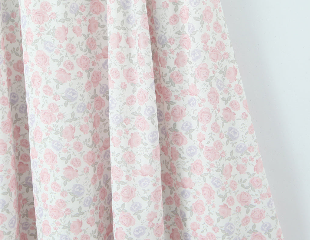 French Floral Lace Slip Dress featuring a delicate pattern of pink and lavender roses on a light background