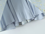 French Floral Mini Slip Dress with delicate floral patterns and a light blue fabric, perfect for warm weather outings
