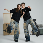 AM Vision RO Graffiti Distressed Wide Leg Jeans in a stylish urban setting, worn by twomodels