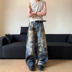 AM Vision RO Graffiti Distressed Wide Leg Jeans with a relaxed fit and unique graphic design