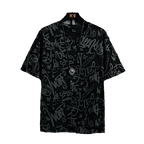 Black grafitti t-shirt with stylish artwork and relaxed fit for urban fashion