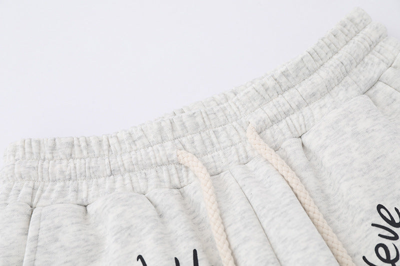 Close-up of Gray Puppy Print Sweatpants featuring a comfortable elastic waistband and drawstring