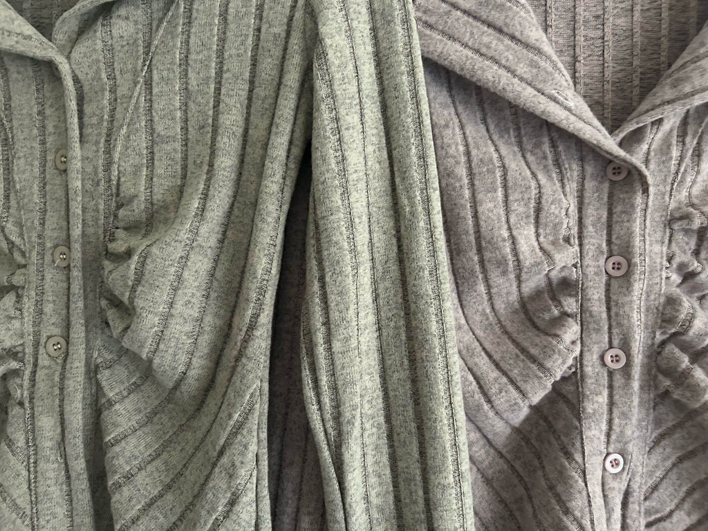 Two grey knitted cardigans with ribbed texture and button details for cozy layering