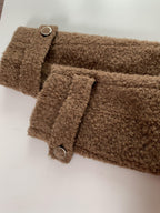 Close-up of sleeves detailing on High-End Loose Fit Wool Winter Coat with button accents