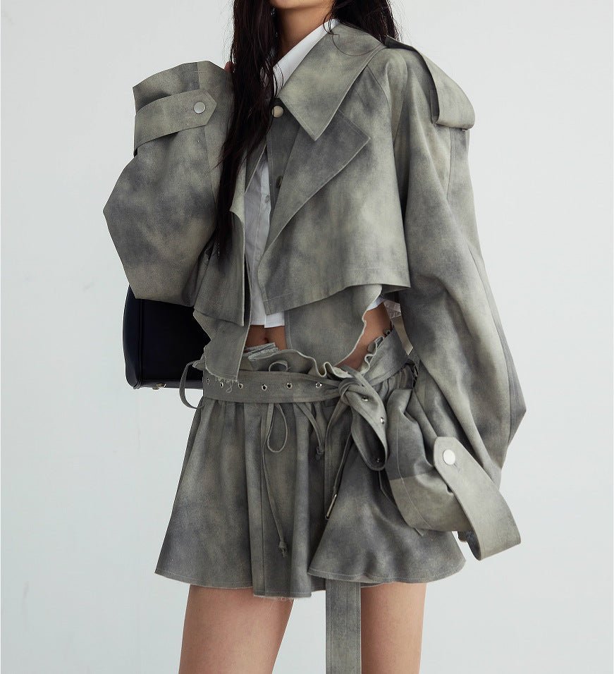 Stylish AM Vision RO Jacket and Skirt Set in muted tones with unique cut and belt detailing