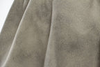 Close-up of soft, textured fabric from AM Vision RO Jacket and Skirt Set in a neutral shade