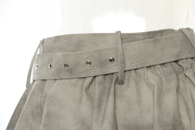 Detail of AM Vision RO Jacket and Skirt Set featuring a stylish belt and soft fabric texture