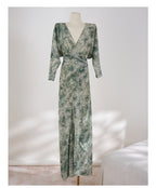 Elegant Jade Silk Wrap Dress featuring a deep V-neck and flowing design for a stylish look